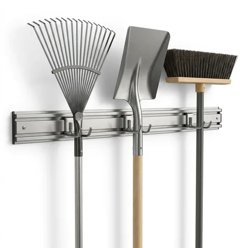 Wall-mounted steel rail with adjustable hooks holding garden tools